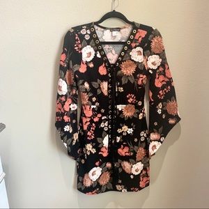 Black floral long sleeve dress with lace up detail